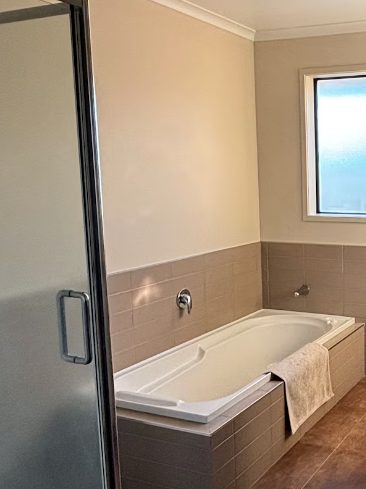 One of three bathrooms